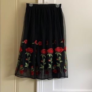 Black and rose patterned skirt